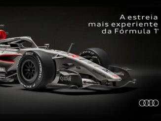 Carro de Fórmula 1 da Audi Revolut F1 Team em acabamento prata e vermelho com patrocinadores como Revolut, Castrol, BP, Pirelli e Qatar, sobre fundo preto, com o texto "A estreia mais experiente da Fórmula 1" e o logotipo da Audi.