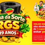 Arte da promoção Urna da Sorte RGS 19 Anos da Rede Grande Sul, com urna preta, trevos verdes, moedas douradas e destaque para R$750 mil em vale-compras.