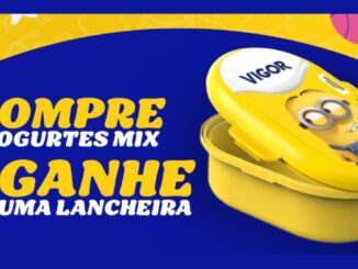 Banner da promoção Compre e Ganhe Dia das Crianças 2026 da Vigor com a frase "Compre 4 iogurtes Mix, ganhe uma lancheira" ao lado de uma lancheira amarela com estampa dos Minions e logotipo Vigor na tampa.