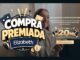 Banner da promoção Compra Premiada Elizabeth com jovem sorridente segurando o celular e destaque para o superprêmio de R$20 mil para obra.