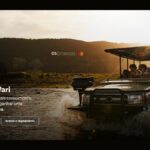 Banner da campanha Missão Safari do C6 Empresas com Mastercard, mostrando um veículo de safári com passageiros atravessando um rio ao pôr do sol na África.