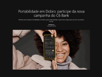 Mulher sorridente de cabelo black power segura um celular com o aplicativo do C6 Bank aberto, sob o título Portabilidade em Dobro: participe da nova campanha do C6 Bank.