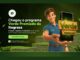 Banner da promoção Verde Premiado da Itograss com personagem animado segurando um celular e placas de madeira com o nome do programa, sobre fundo verde com placas de grama.