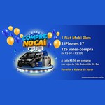 Arte da Promoção Compre no Caí com logotipo da campanha, Fiat Mobi preto, três iPhones, vales-compra e balões azuis e amarelos, ao lado do texto com os prêmios: 1 Fiat Mobi 0km, 3 iPhones 17 e 125 vales-compra de R$50 a R$500
