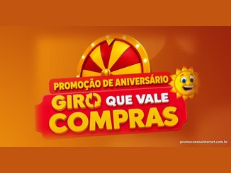 Logotipo da promoção de aniversário Giro que Vale Compras, da Rede Sol Supermercados, com roleta dourada e vermelha, faixa vermelha com o nome da campanha em amarelo e branco e o sol sorridente da marca, sobre fundo laranja.