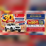 Arte da promoção Aniversário Paraná 30 Anos, do Paraná Supermercados, com um Renault Kwid branco entre carrinhos de compras, o texto "Concorra a um carro 0 km", o painel "Vales-compras de R$50,00 cada" e o sorteio de R$70.000,00 em cartão pré-pago para comprar um carro 0 km.