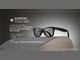 Óculos de sol Ray-Ban Meta Wayfarer pousado sobre uma superfície curva, ao lado do texto "Sorteio todo mês: clientes estrela concorrem a óculos de sol Ray-Ban Meta Wayfarer" e do selo de patrocínio Óticas Carol.
