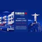 Arte da campanha Yamaha+ com o logotipo da marca ao centro, o texto "Viagens para Miami e Rio", a indicação de 30 prêmios e R$311 mil, ilustração de prédios e carro antigo de Miami à esquerda e Cristo Redentor à direita.