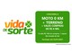 Logotipo Vida de Sorte com trevo verde ao lado de painel verde que anuncia moto 0 km, terreno e vales-compras de R$8 mil, com participação até 23/01/2027 no Rio Grande do Sul.